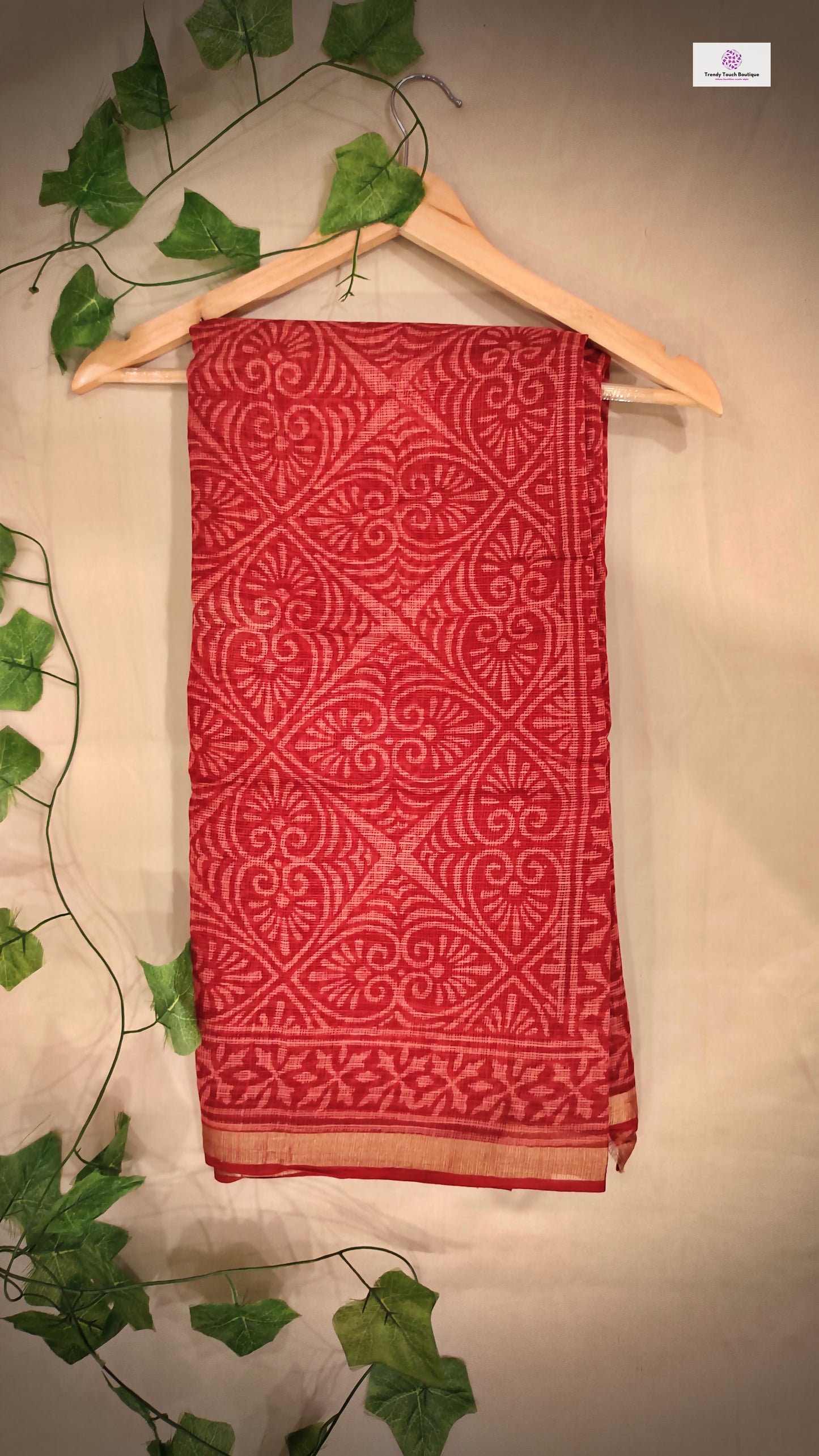 Hand block printed maroon Kota Doria saree with natural dyes, floral and paisley patterns, lightweight and skin-friendly.