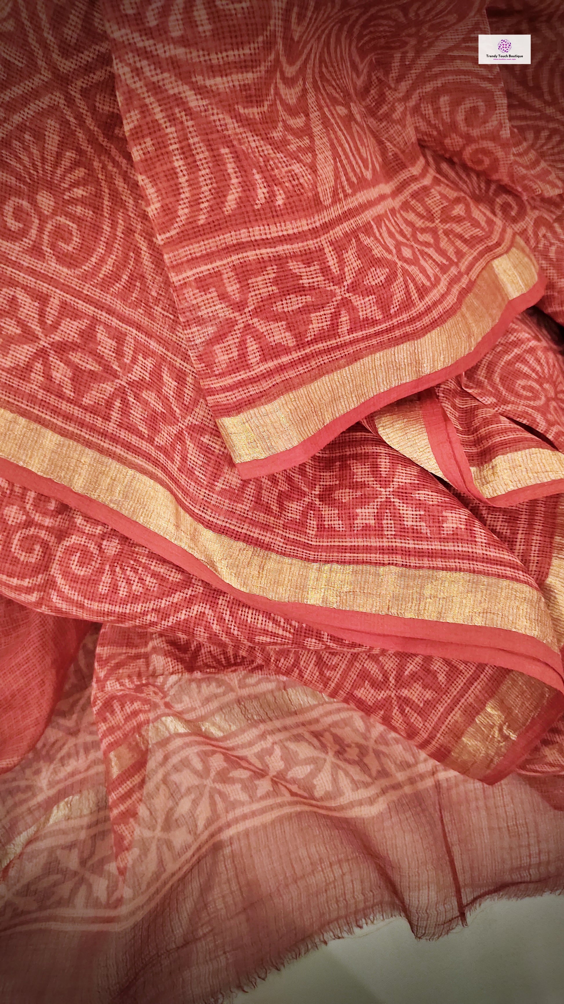 Hand block printed maroon Kota Doria saree with natural dyes, floral and paisley patterns, lightweight and skin-friendly.