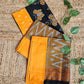 pochampally ikkat cotton handloom saree for office and casual outing summer special in black and orange with ikkat blouse piece