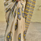 handblockprinted mulcotton in beige base with blue, yellow and black for office and casual styling summer best fabric saree with blouse piece and best price