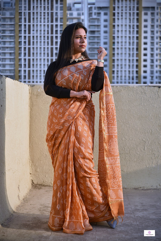 pastel orange handblock print small buti print natural dye chnaderi silk saree for every day casual wear or office styling in summer
