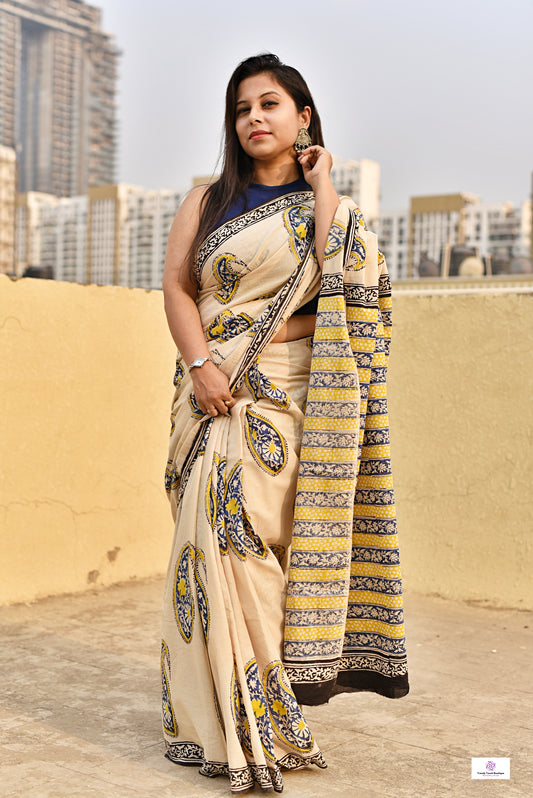 handblockprinted mulcotton in beige base with blue, yellow and black for office and casual styling summer best fabric saree with blouse piece and best price