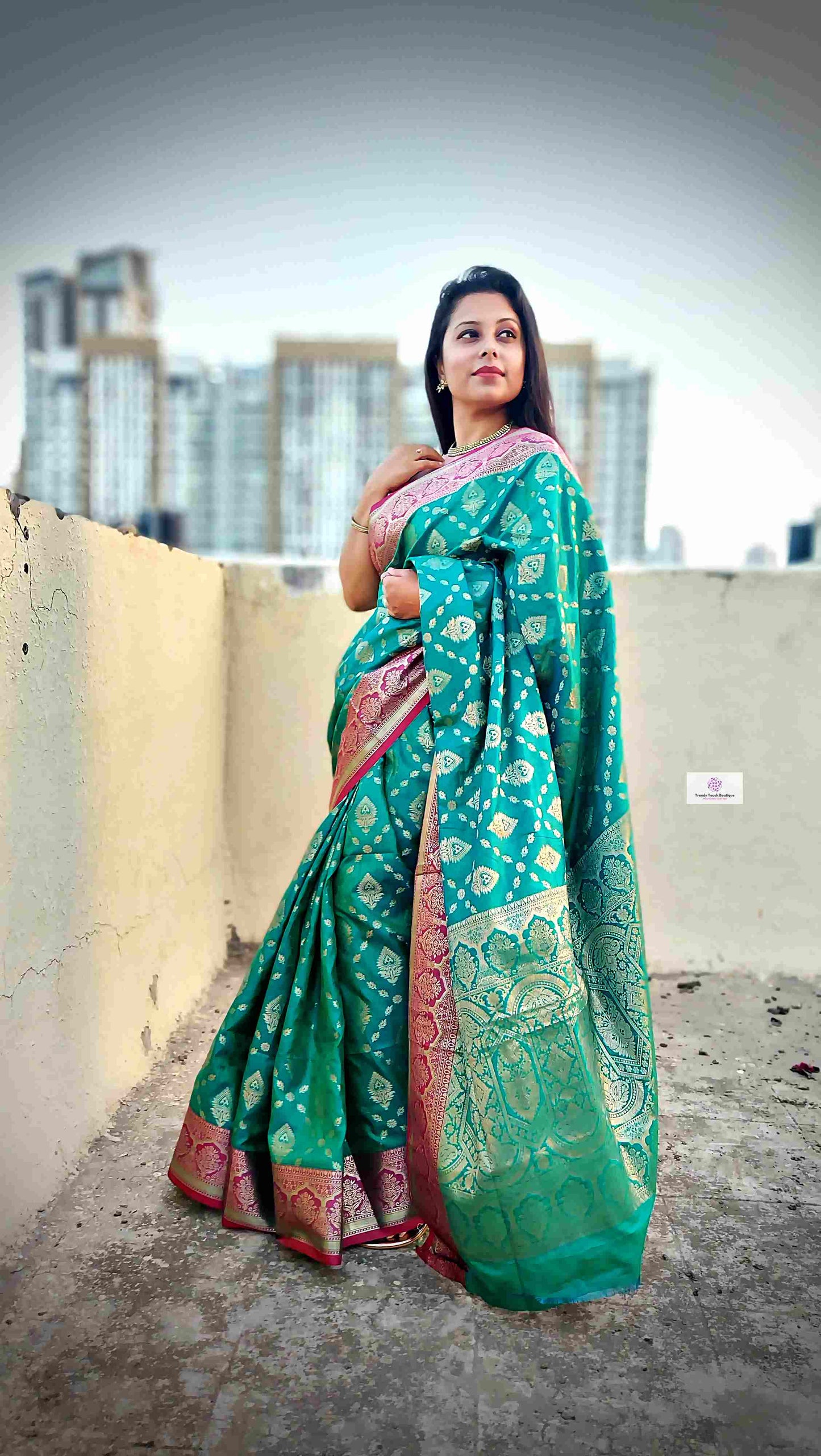 teal green and pink silk festive wear saree with blouse piece