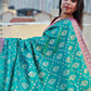 shop saree online teal green and pink silk festive wear saree with blouse piece