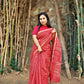 Hand block printed maroon Kota Doria saree with natural dyes, floral and paisley patterns, lightweight and skin-friendly.