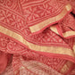 Hand block printed maroon Kota Doria saree with natural dyes, floral and paisley patterns, lightweight and skin-friendly.